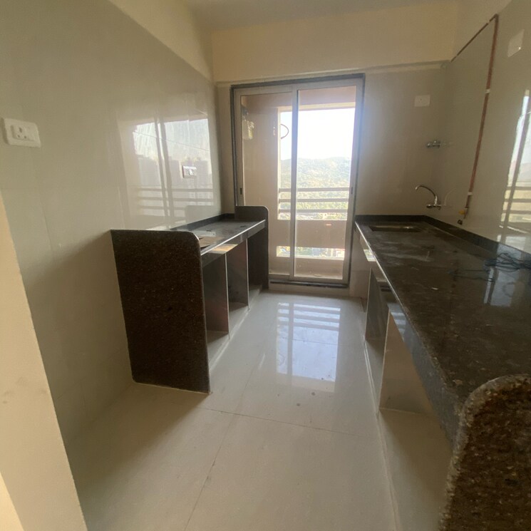 Kitchen, delta-woods 2 Bedroom 669 Sq.Ft. Apartment In Penkarpada Thane 9185132