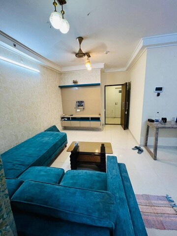 Living Room in 2 BHK Apartment at Duville Riverdale Heights, Kharadi – for Rent