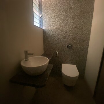 Bathroom in 1 BHK Apartment at Delta Woods, Penkarpada – for Rent