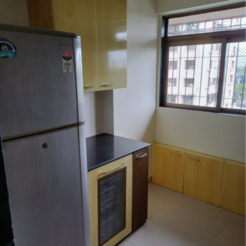 Kitchen in 1 BHK Apartment at Ajmera Valencia, Bhakti Park – for Rent