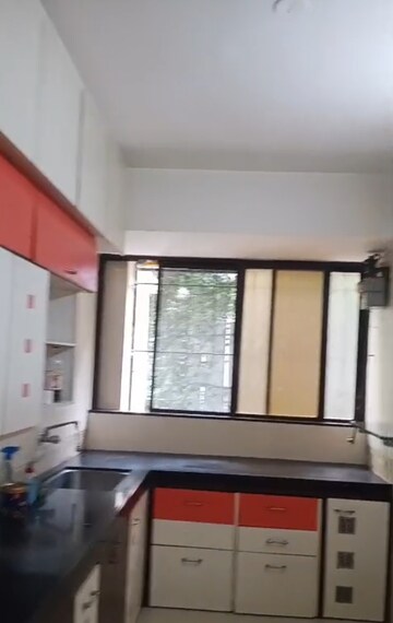 Kitchen in 2 BHK Apartment at Miraj Residency, Malad West – for Rent