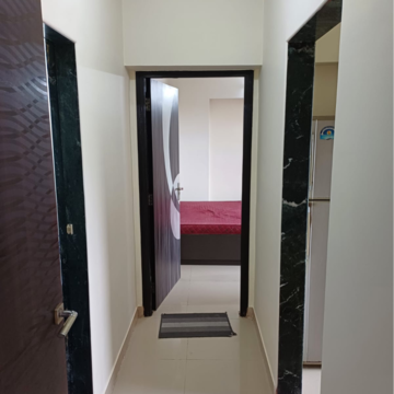 Building Lobby in 1 BHK Apartment at Ajmera Cosmic Heights, Bhakti Park – for Rent