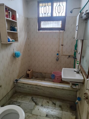 Bathroom in 1 RK Villa at RWA Apartments Sector 27, Sector 27 – for Rent