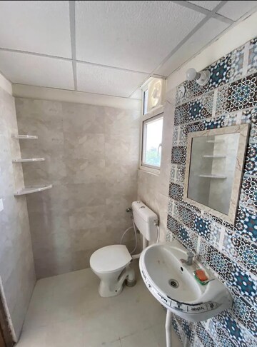 Bathroom in 2 BHK Apartment at Signature Global Proxima, Sector 89 – for Rent