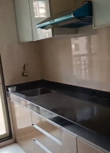 Kitchen in 2 BHK Apartment at Agarwal Paramount, Virar West – for Sale