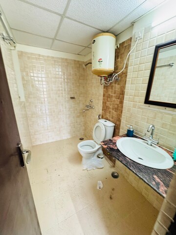 Bathroom in 3 BHK Apartment at Amrapali Crystal Homes, Sector 76 – for Rent