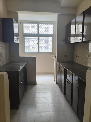 Kitchen in 3 BHK Apartment at Amrapali Silicon City, Sector 76 – for Rent