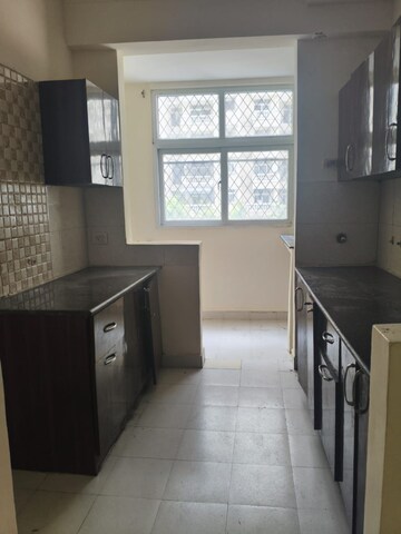 Kitchen in 3 BHK Apartment at Amrapali Silicon City, Sector 76 – for Rent