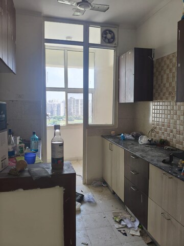 Kitchen in 2 BHK Apartment at Amrapali Silicon City, Sector 76 – for Rent