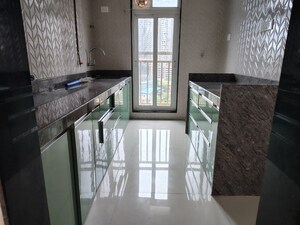 Kitchen in 2 BHK Apartment at Ruparel Ariana, Parel – for Rent