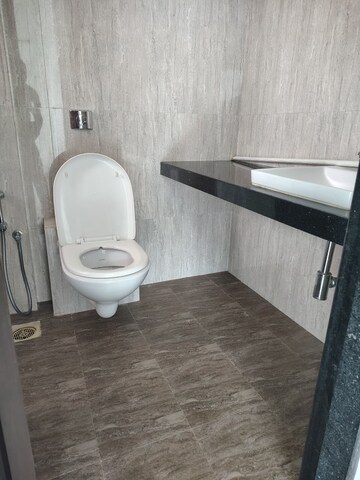 Bathroom in 2 BHK Apartment at Ruparel Ariana, Parel – for Rent