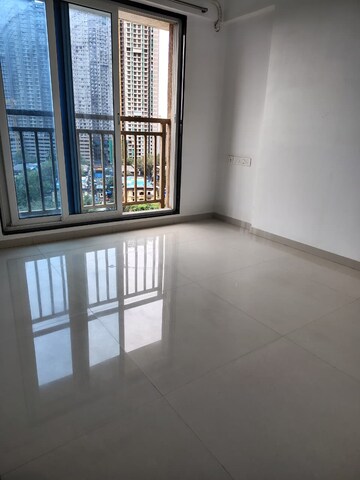 Master Bedroom in 2 BHK Apartment at Ruparel Ariana, Parel – for Rent