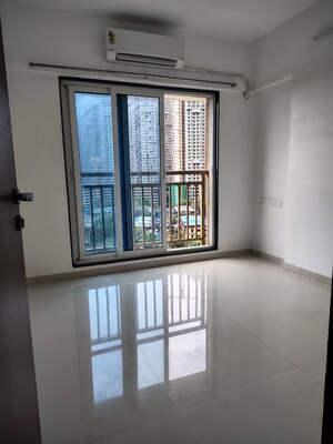 Bedroom in 2 BHK Apartment at Ruparel Ariana, Parel – for Rent