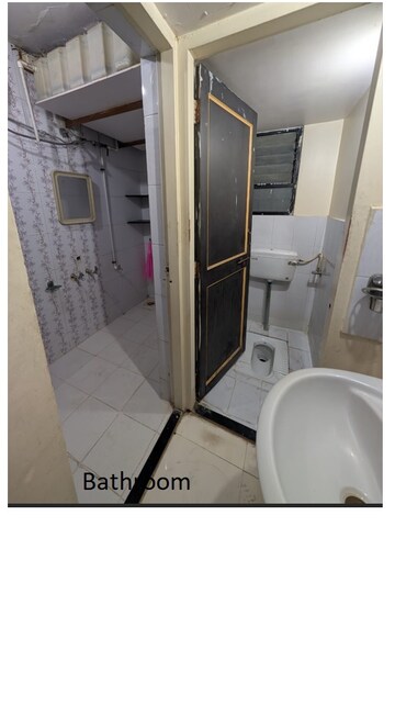 Bathroom in 1 BHK Apartment at Vishal Srushti Residency, Wadgaon Sheri – for Rent