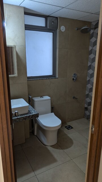 Bathroom in 3 BHK Apartment at Kalpataru Immensa, Kolshet Road – for Rent