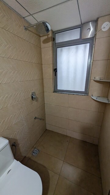 Bathroom in 3 BHK Apartment at Kalpataru Immensa, Kolshet Road – for Rent