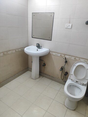 Bathroom in 1 RK Apartment at AWHO Brahmaputra Apartments, Sector 29 – for Rent