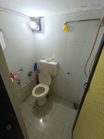 Bathroom in 2 BHK Apartment at Sagar Garden, Mulund West – for Rent