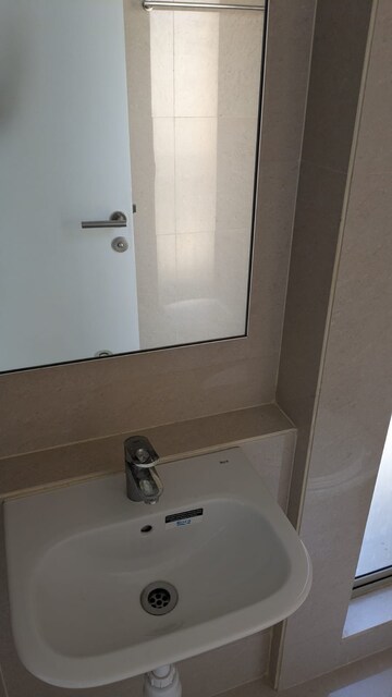 Bathroom in 1 BHK Apartment at RDC Pinewood, Thane West – for Sale