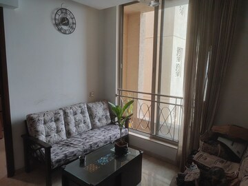 Living Room in 1 BHK Apartment at Dedhia Platinum Lawns, Ghodbunder Road – for Sale