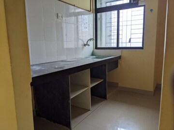 Kitchen in 1 BHK Apartment at Kishor Sukur Enclave A, Ghodbunder Road – for Sale