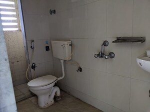 Bathroom in 1 BHK Apartment at Kishor Sukur Enclave A, Ghodbunder Road – for Sale