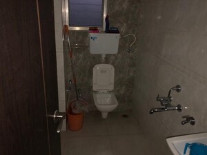 Bathroom in 1 BHK Apartment at Unnathi Woods Phase 3, Ghodbunder Road – for Sale