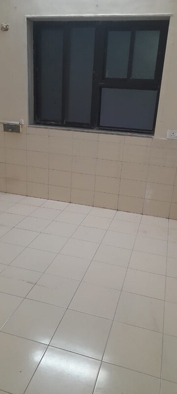 Bathroom in 1 BHK Apartment at Raunak Unnathi Woods Phase 3, Ghodbunder Road – for Sale