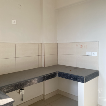 Kitchen in 2 BHK Apartment at Tata Eureka Park, Sector 150 – for Rent