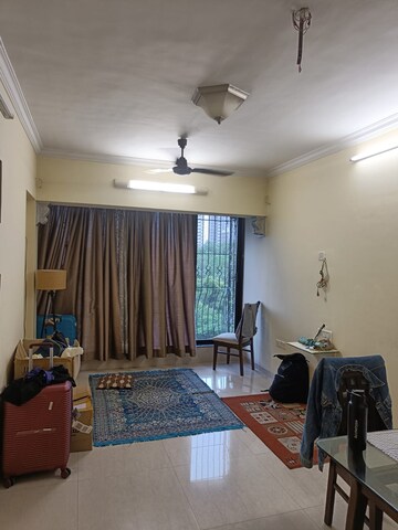 Living Room in 1 BHK Apartment at Miraj Residency, Malad West – for Sale