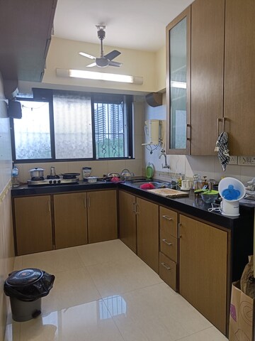 Kitchen in 1 BHK Apartment at Miraj Residency, Malad West – for Sale
