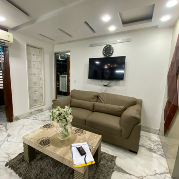 Living Room in 2 BHK Apartment at Eldeco Live By The Greens, Sector 150 – for Rent