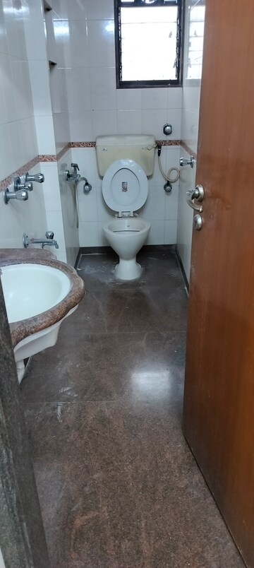 Bathroom in 2 BHK Apartment at Manish Tower, Andheri West – for Rent