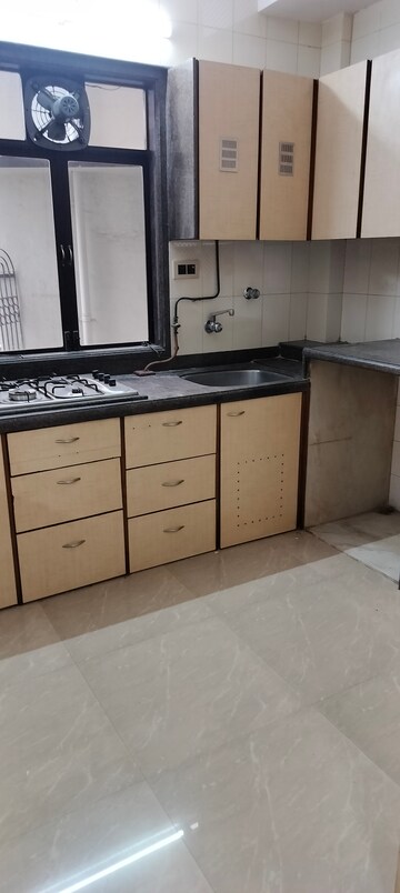 Kitchen in 2 BHK Apartment at Manish Tower, Andheri West – for Rent