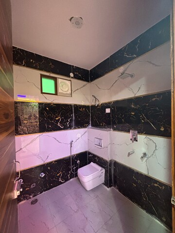 Bathroom in 3 BHK Builder Floor at Dwarka Mor – for Rent