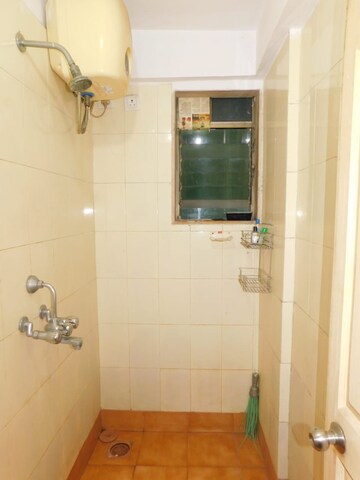 Bathroom in 1 BHK Apartment at Riddhi Garden, Malad East – for Rent