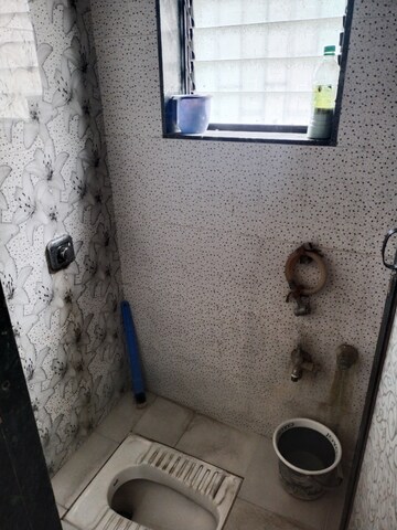 Bathroom in 1 RK Apartment at Om Navjeevan CHS, Bhandup East – for Rent