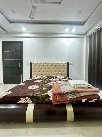Bedroom in 4 BHK Builder Floor at Sushant Lok ii – for Rent