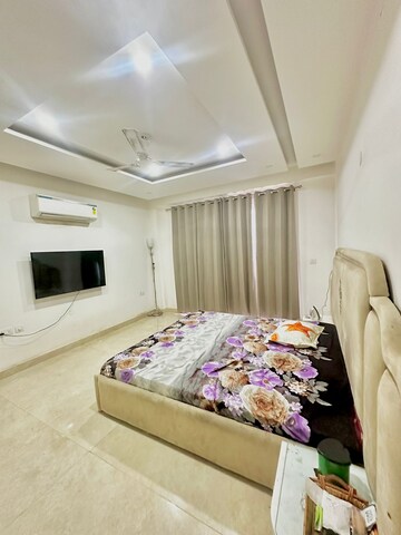 Bedroom in 4 BHK Builder Floor at Sushant Lok ii – for Rent