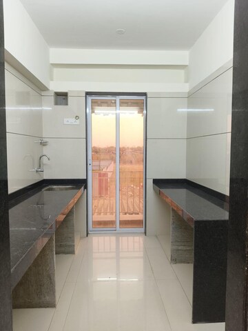 Kitchen in 1 BHK Apartment at Ritu Gardenia, Naigaon East – for Sale