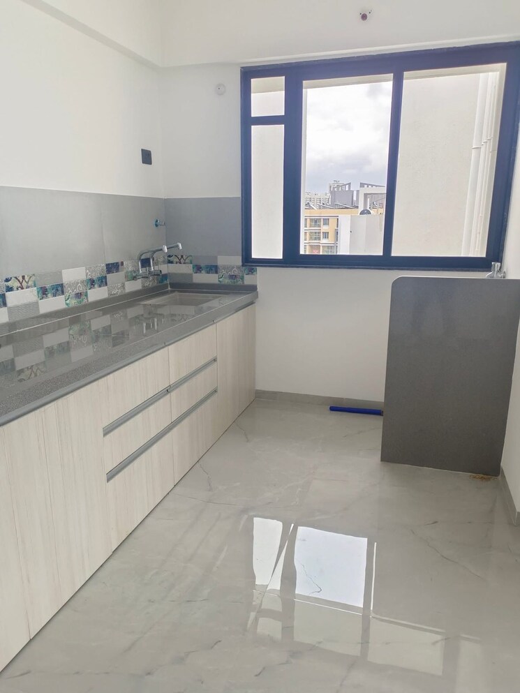 Kitchen, unique-youtopia 3 Bedroom 1009 Sq.Ft. Apartment In Kharadi Pune 9186030