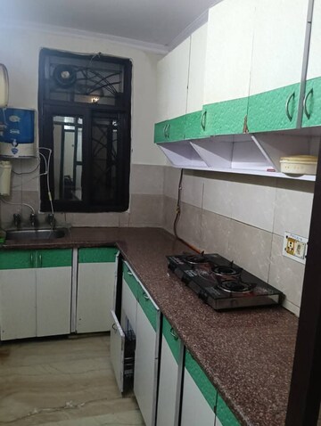 Kitchen in 2 BHK Builder Floor at RWA Azadpur Colony, Model Town – for Rent