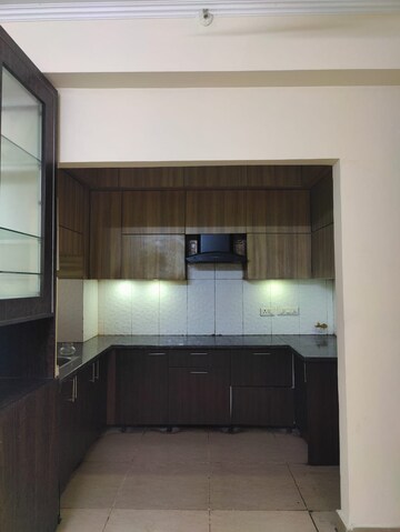 Kitchen in 2 BHK Apartment at Mahagun Mywoods, Sector 16c Greater Noida – for Rent