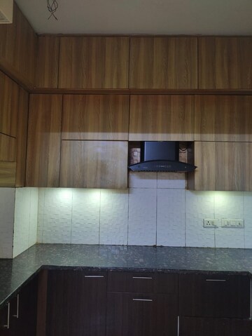 Kitchen in 2 BHK Apartment at Mahagun Mywoods, Sector 16c Greater Noida – for Rent