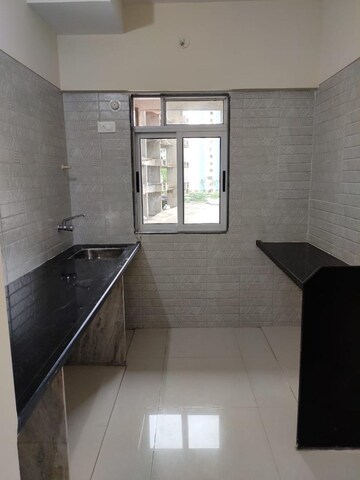 Kitchen in 2 BHK Apartment at Runwal Eirene, Balkum Pada – for Rent