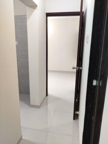Building Lobby in 2 BHK Apartment at Runwal Eirene, Balkum Pada – for Rent