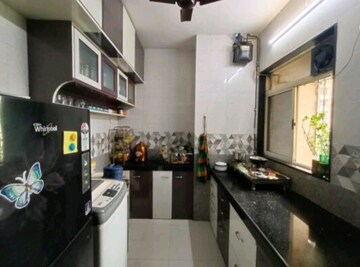 Kitchen in 2 BHK Apartment at Swastik Residency 1, Ghodbunder Road – for Rent