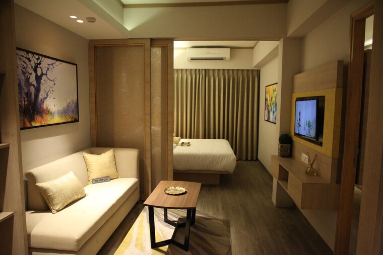 Living Room, uniwest-aero-hub Studio 475 Sq.Ft. Apartment In Sector 22d Yamuna Expressway Greater Noida 9186249