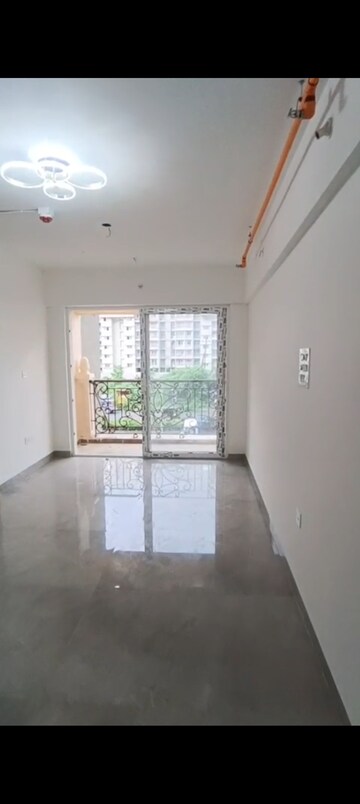 Living Room in 2 BHK Apartment at Tharwani Palladian, Kharghar – for Sale