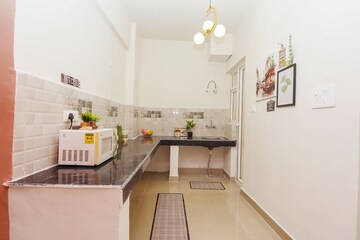 Kitchen in 3 BHK Apartment at Gaur Sportswood, Sector 79 – for Rent